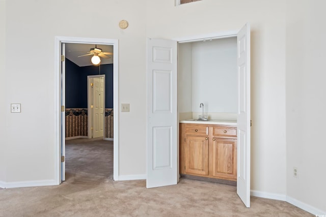 914 Dock Pl, Murrells Inlet, SC 29576 - corridor featuring light carpet, a sink, and baseboards