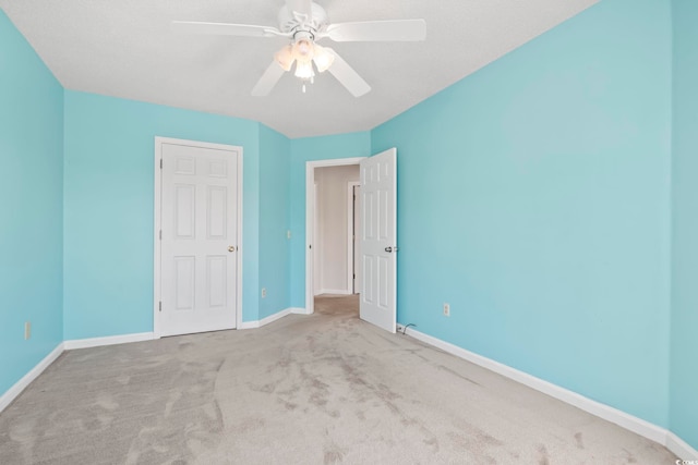 914 Dock Pl, Murrells Inlet, SC 29576 - unfurnished bedroom with carpet, baseboards, and a ceiling fan