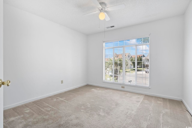 914 Dock Pl, Murrells Inlet, SC 29576 - carpeted empty room with ceiling fan, a textured ceiling, and baseboards