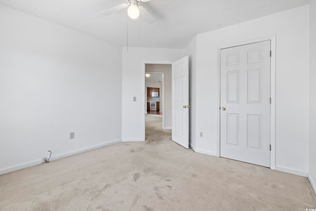914 Dock Pl, Murrells Inlet, SC 29576 - unfurnished bedroom with carpet, baseboards, and ceiling fan
