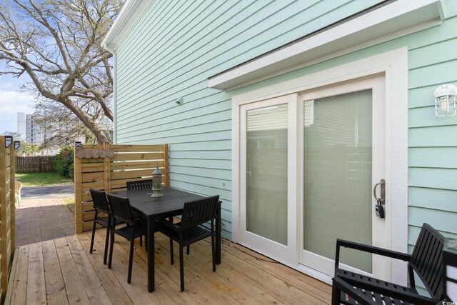 4307 Beverly Ct, North Myrtle Beach, SC 29582 - wooden terrace with outdoor dining area