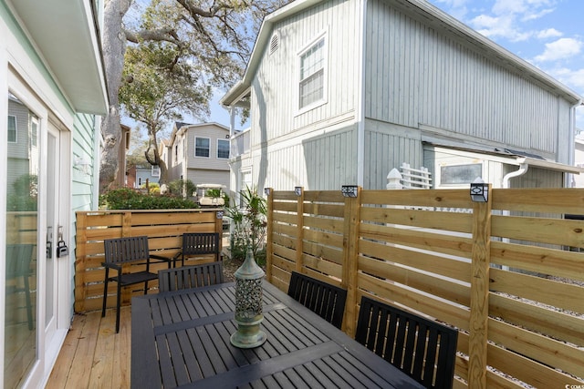 4307 Beverly Ct, North Myrtle Beach, SC 29582 - wooden deck featuring outdoor dining area