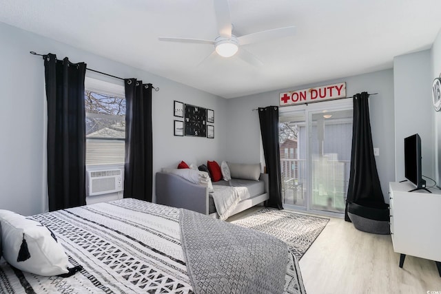 4307 Beverly Ct, North Myrtle Beach, SC 29582 - bedroom with wood finished floors, multiple windows, access to outside, and cooling unit