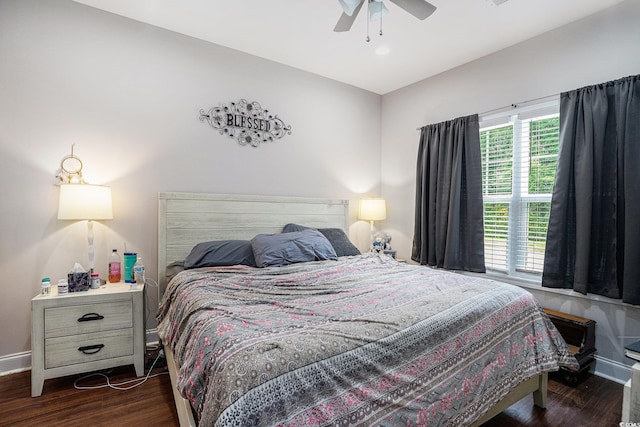 2472 Bayboro St Unit C, Loris, SC 29569 - bedroom featuring baseboards, wood finished floors, and a ceiling fan