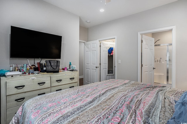 2472 Bayboro St Unit C, Loris, SC 29569 - bedroom with ensuite bath, a ceiling fan, and a spacious closet