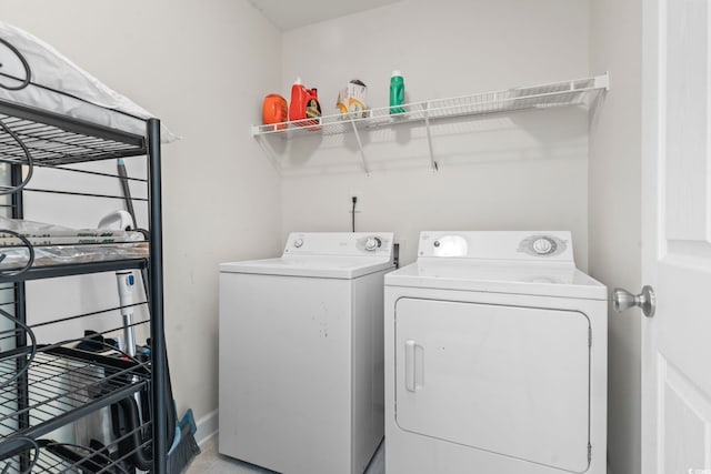 176 Whispering Oaks Dr, Longs, SC 29568 - laundry area with separate washer and dryer and baseboards