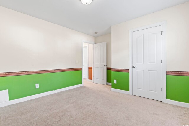 176 Whispering Oaks Dr, Longs, SC 29568 - unfurnished bedroom featuring baseboards and carpet