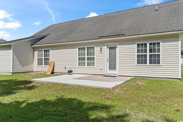 176 Whispering Oaks Dr, Longs, SC 29568 - back of property featuring a patio area, a yard, and roof with shingles