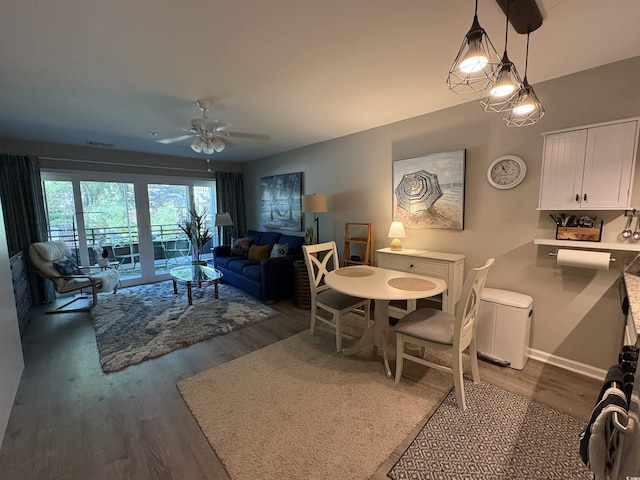 415 Ocean Creek Dr Unit 2117, Myrtle Beach, SC 29572 - dining space with wood finished floors, ceiling fan, and baseboards