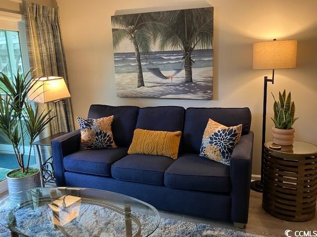 415 Ocean Creek Dr Unit 2117, Myrtle Beach, SC 29572 - living room featuring wood finished floors