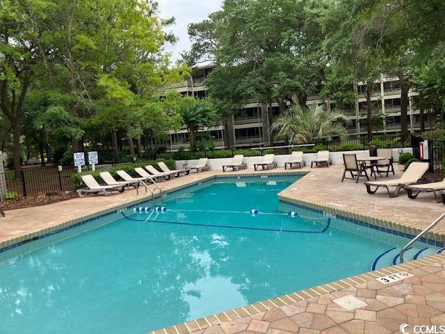 415 Ocean Creek Dr Unit 2117, Myrtle Beach, SC 29572 - community pool with a patio area