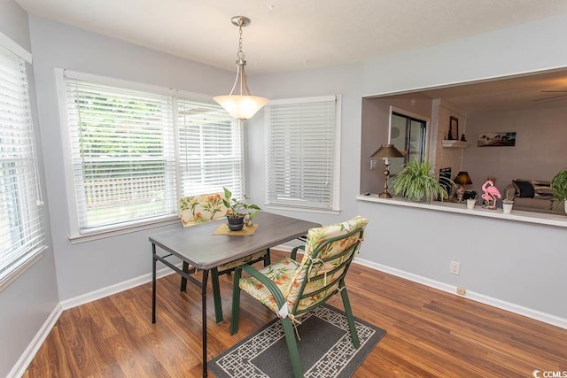 18 Pine Valley Ln, Surfside Beach, SC 29575 - dining area with wood finished floors and baseboards