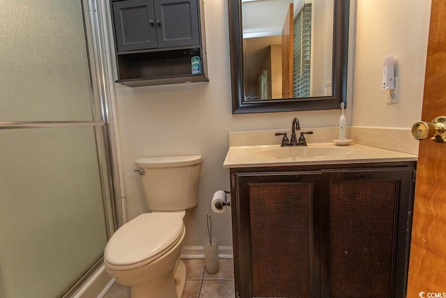 18 Pine Valley Ln, Surfside Beach, SC 29575 - bathroom with vanity, a shower stall, toilet, tile patterned flooring, and baseboards