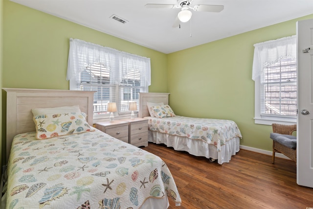 161 Easy St, Garden City Beach, SC 29576 - bedroom featuring dark wood-style flooring, baseboards, and ceiling fan