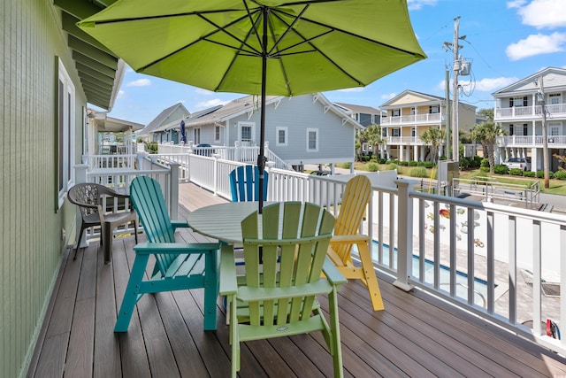 161 Easy St, Garden City Beach, SC 29576 - wooden terrace featuring a residential view and outdoor dining area
