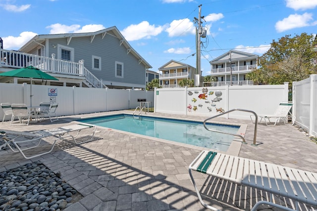 161 Easy St, Garden City Beach, SC 29576 - view of swimming pool featuring a patio and a fenced backyard