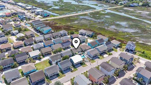 161 Easy St, Garden City Beach, SC 29576 - aerial view of property and surrounding area with a large body of water and nearby suburban area