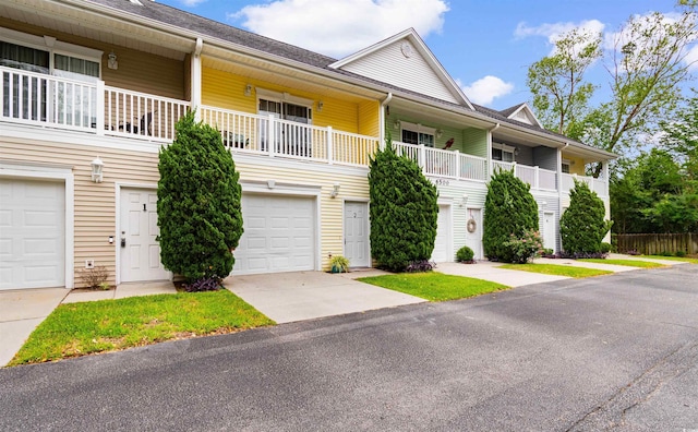 6500 Colonial Dr Unit 2, Myrtle Beach, SC 29572 - view of front facade with a garage and concrete driveway