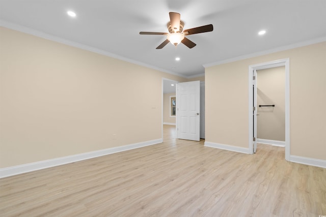 409 14th Ave S, North Myrtle Beach, SC 29582 - unfurnished bedroom featuring light wood-style flooring, ornamental molding, recessed lighting, baseboards, and a spacious closet
