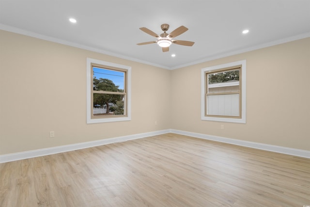 409 14th Ave S, North Myrtle Beach, SC 29582 - unfurnished room featuring healthy amount of natural light, a ceiling fan, light wood finished floors, ornamental molding, and recessed lighting