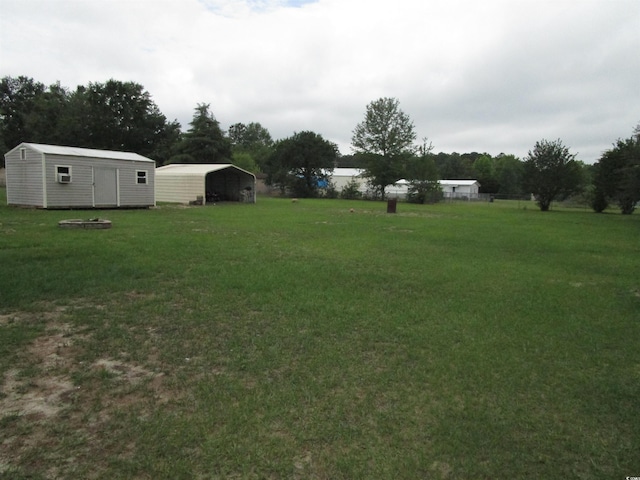 5578 Dongola Hwy, Conway, SC 29527 - view of green lawn featuring a detached carport