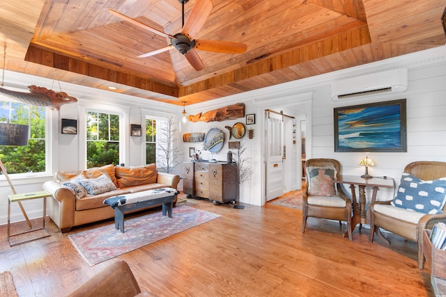 309 Sunset Trl, Myrtle Beach, SC 29577 - living area with a wall mounted AC, wood ceiling, light wood-style flooring, a ceiling fan, and a raised ceiling