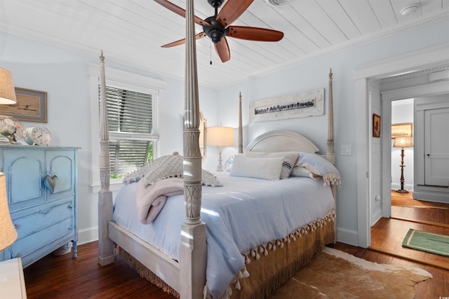 309 Sunset Trl, Myrtle Beach, SC 29577 - bedroom with baseboards, wood finished floors, ornamental molding, wood ceiling, and ceiling fan