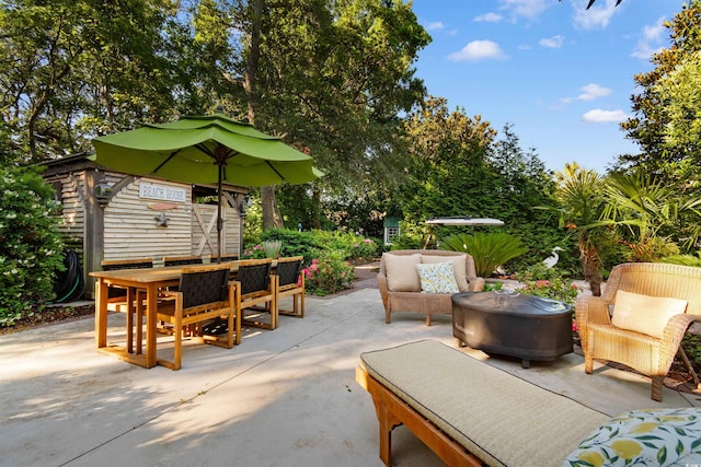309 Sunset Trl, Myrtle Beach, SC 29577 - view of patio featuring outdoor dining space and an outdoor hangout area