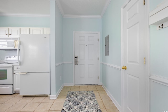 6015 Catalina Dr Unit 134, North Myrtle Beach, SC 29582 - kitchen featuring white appliances, electric panel, light tile patterned flooring, white cabinetry, and crown molding