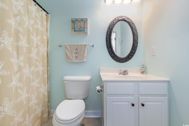 6015 Catalina Dr Unit 134, North Myrtle Beach, SC 29582 - bathroom with vanity, toilet, baseboards, and a shower with shower curtain