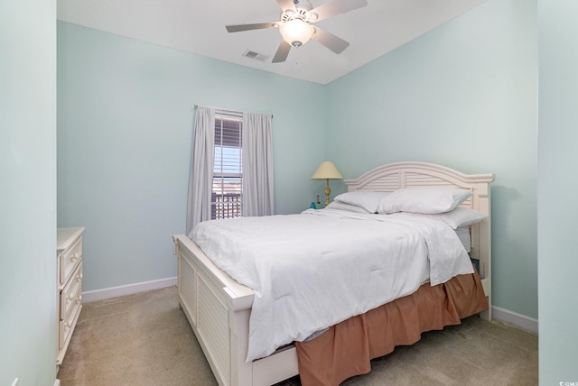 6015 Catalina Dr Unit 134, North Myrtle Beach, SC 29582 - bedroom with light colored carpet, baseboards, and a ceiling fan