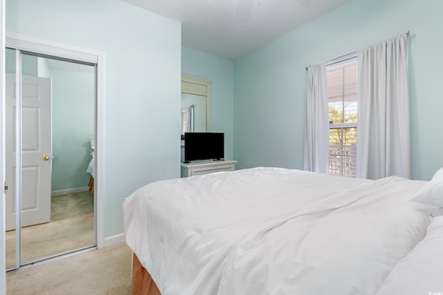 6015 Catalina Dr Unit 134, North Myrtle Beach, SC 29582 - carpeted bedroom with a closet and baseboards