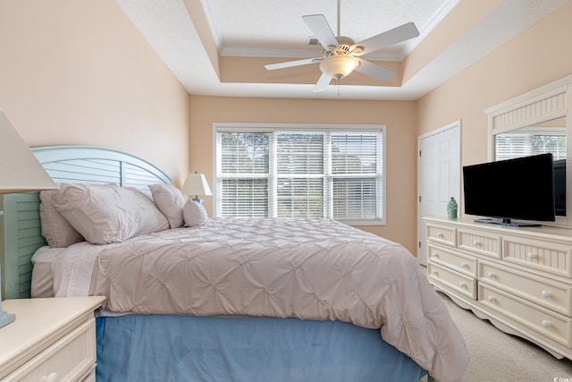 6015 Catalina Dr Unit 134, North Myrtle Beach, SC 29582 - bedroom featuring a raised ceiling, crown molding, light carpet, and ceiling fan
