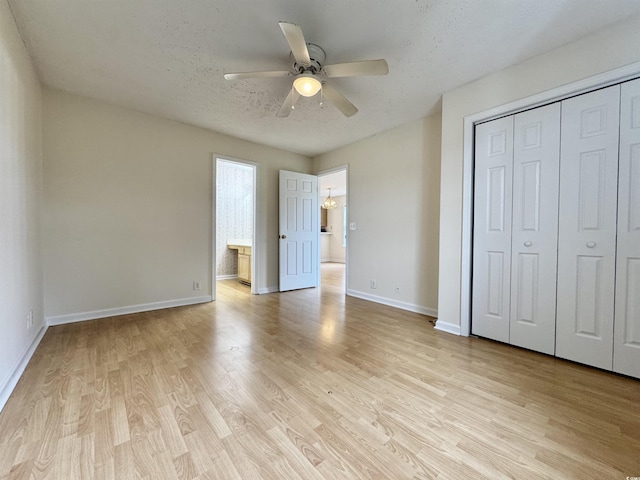 665 Tupelo Ln Unit 17-D, Longs, SC 29568 - unfurnished bedroom with light wood-style floors, baseboards, a closet, and a ceiling fan