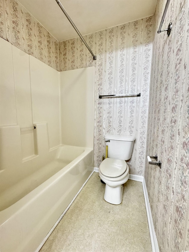 665 Tupelo Ln Unit 17-D, Longs, SC 29568 - bathroom with shower / tub combination, toilet, wallpapered walls, and baseboards