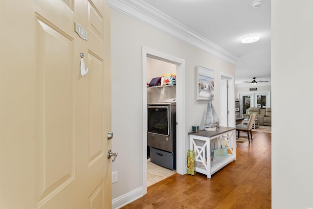 186 Ella Kinley Cir Unit 101, Myrtle Beach, SC 29588 - corridor with crown molding, wood finished floors, and baseboards