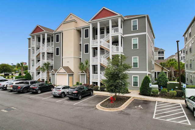 186 Ella Kinley Cir Unit 101, Myrtle Beach, SC 29588 - view of building exterior with uncovered parking
