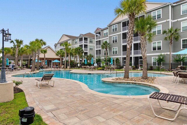 186 Ella Kinley Cir Unit 101, Myrtle Beach, SC 29588 - community pool featuring a patio area