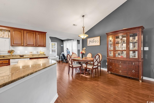 156 Hummingbird Ct, Myrtle Beach, SC 29579 - dining space with vaulted ceiling, wood finished floors, and baseboards