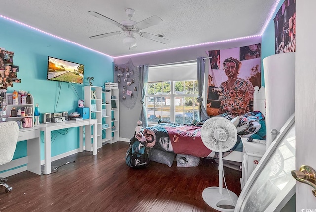 156 Hummingbird Ct, Myrtle Beach, SC 29579 - bedroom featuring a textured ceiling, wood finished floors, and a ceiling fan
