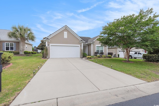 15 Saltwind Loop, Murrells Inlet, SC 29576 - view of front of house with driveway, an attached garage, and a front yard