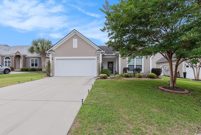 15 Saltwind Loop, Murrells Inlet, SC 29576 - view of front of house featuring an attached garage, driveway, and a front yard