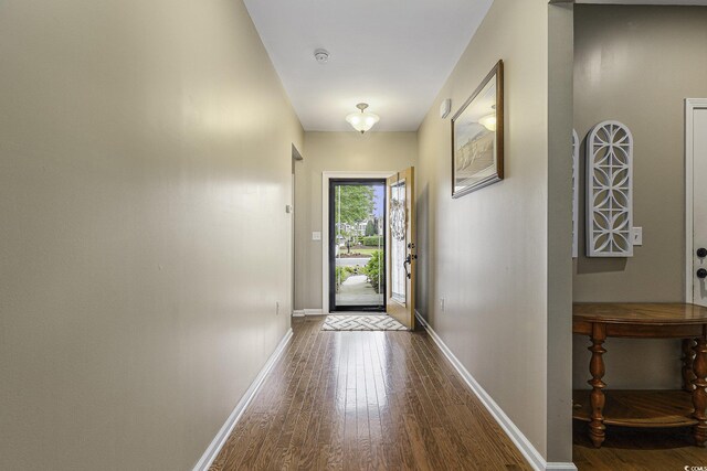15 Saltwind Loop, Murrells Inlet, SC 29576 - doorway to outside with wood finished floors and baseboards
