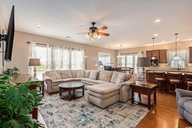 15 Saltwind Loop, Murrells Inlet, SC 29576 - living area featuring ceiling fan, wood finished floors, recessed lighting, and a chandelier