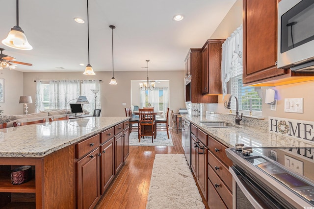 15 Saltwind Loop, Murrells Inlet, SC 29576 - kitchen with stainless steel appliances, a sink, plenty of natural light, and recessed lighting