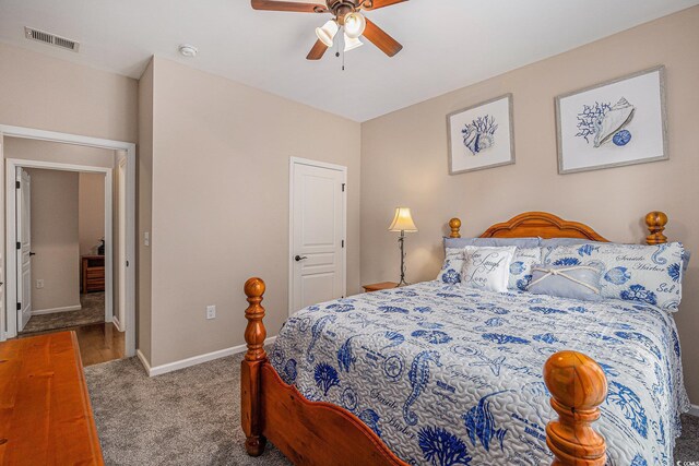 15 Saltwind Loop, Murrells Inlet, SC 29576 - bedroom with carpet floors, baseboards, and a ceiling fan