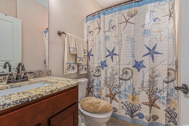 15 Saltwind Loop, Murrells Inlet, SC 29576 - bathroom featuring toilet, vanity, and curtained shower