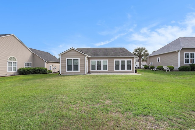 15 Saltwind Loop, Murrells Inlet, SC 29576 - back of property featuring a yard and a patio