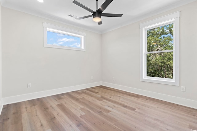 4617 Hedrick St, North Myrtle Beach, SC 29582 - spare room with plenty of natural light, ceiling fan, light wood-type flooring, and crown molding