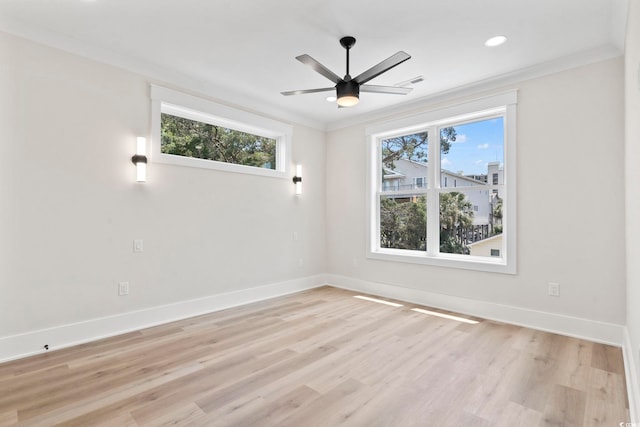 4617 Hedrick St, North Myrtle Beach, SC 29582 - unfurnished room featuring light wood-style flooring, ornamental molding, a ceiling fan, and recessed lighting